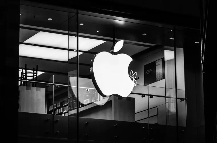 Monochrome photograph of the first floor of the Exeter Princesshay Apple Store in the early morning